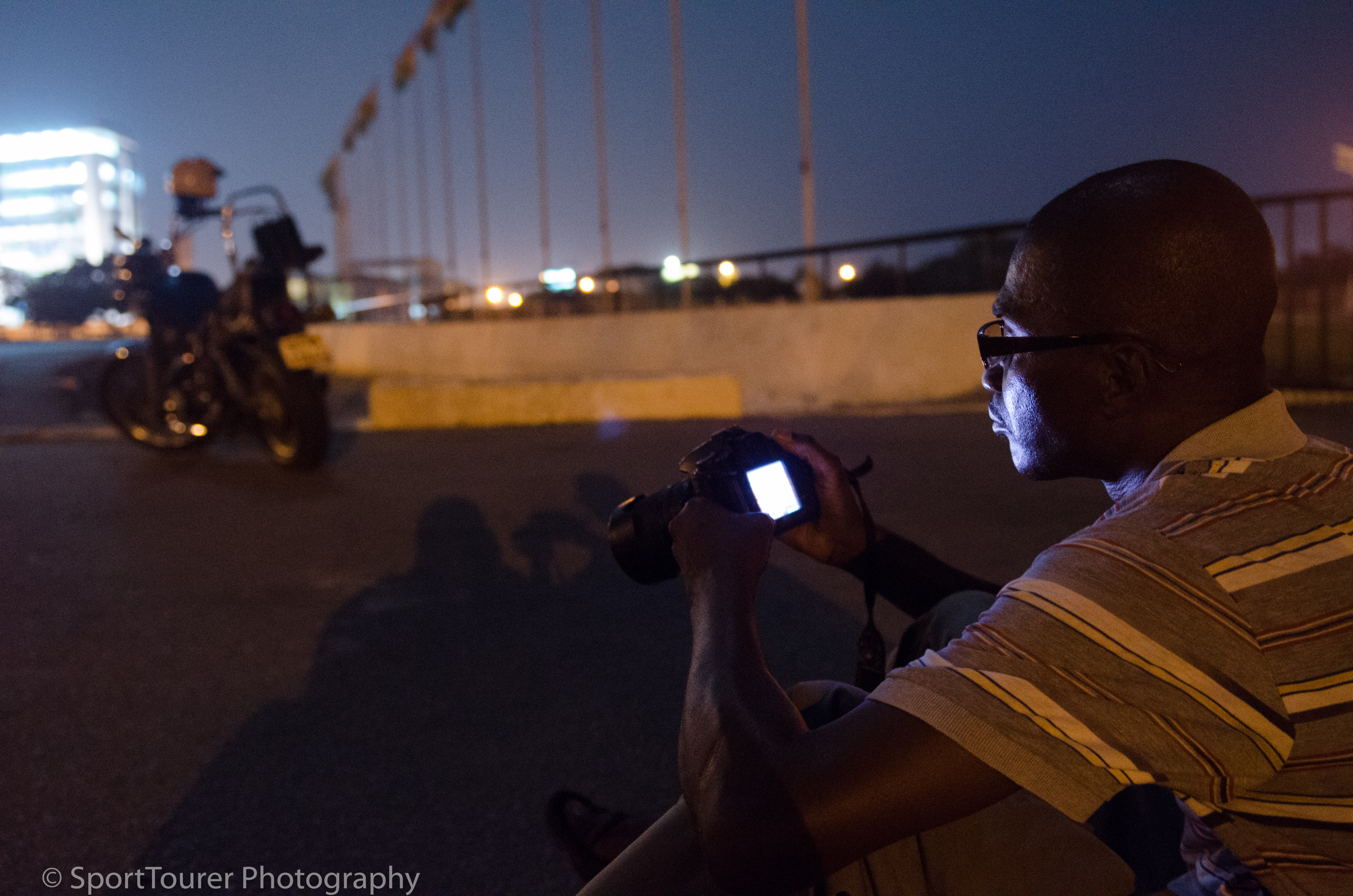  Not only did he love riding pillion with me, Francis shared an equal passion for photography as well. This was a great night for photography in the streets of Accra, Ghana, 2011. R.I.P. my friend, you are truly missed and remembered. 