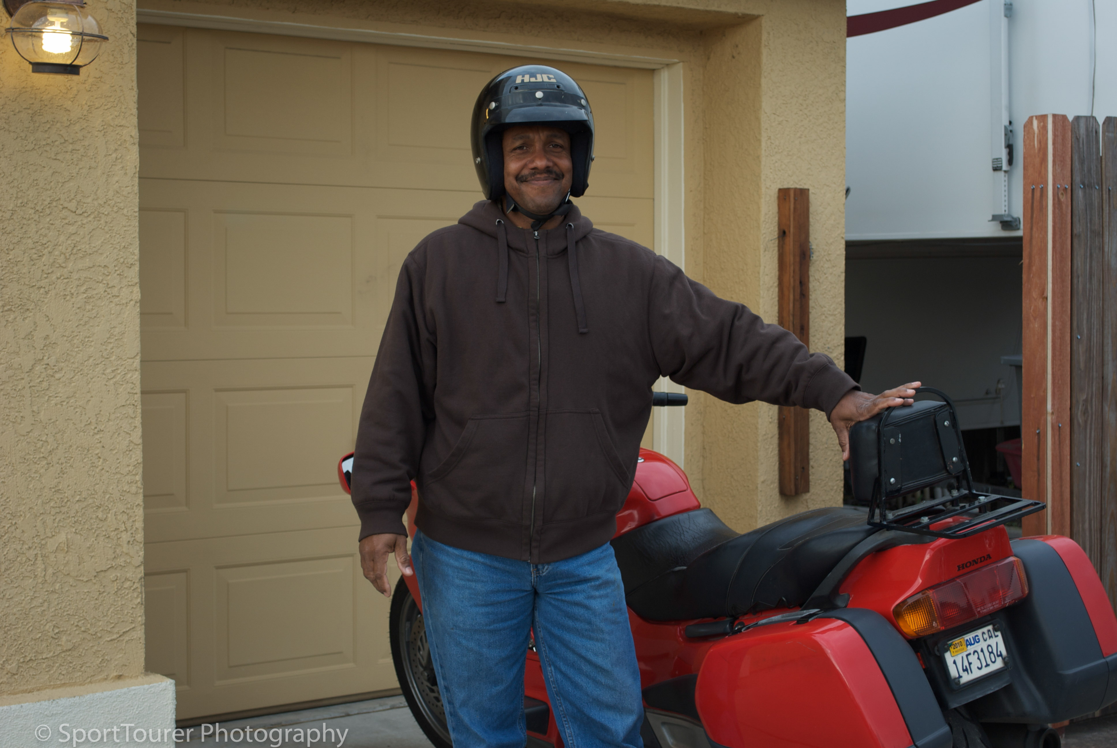  Paid for and taking delivery of my 1st Sport Touring machine. California 2010. The smile on my face says it all, I'm sure! 