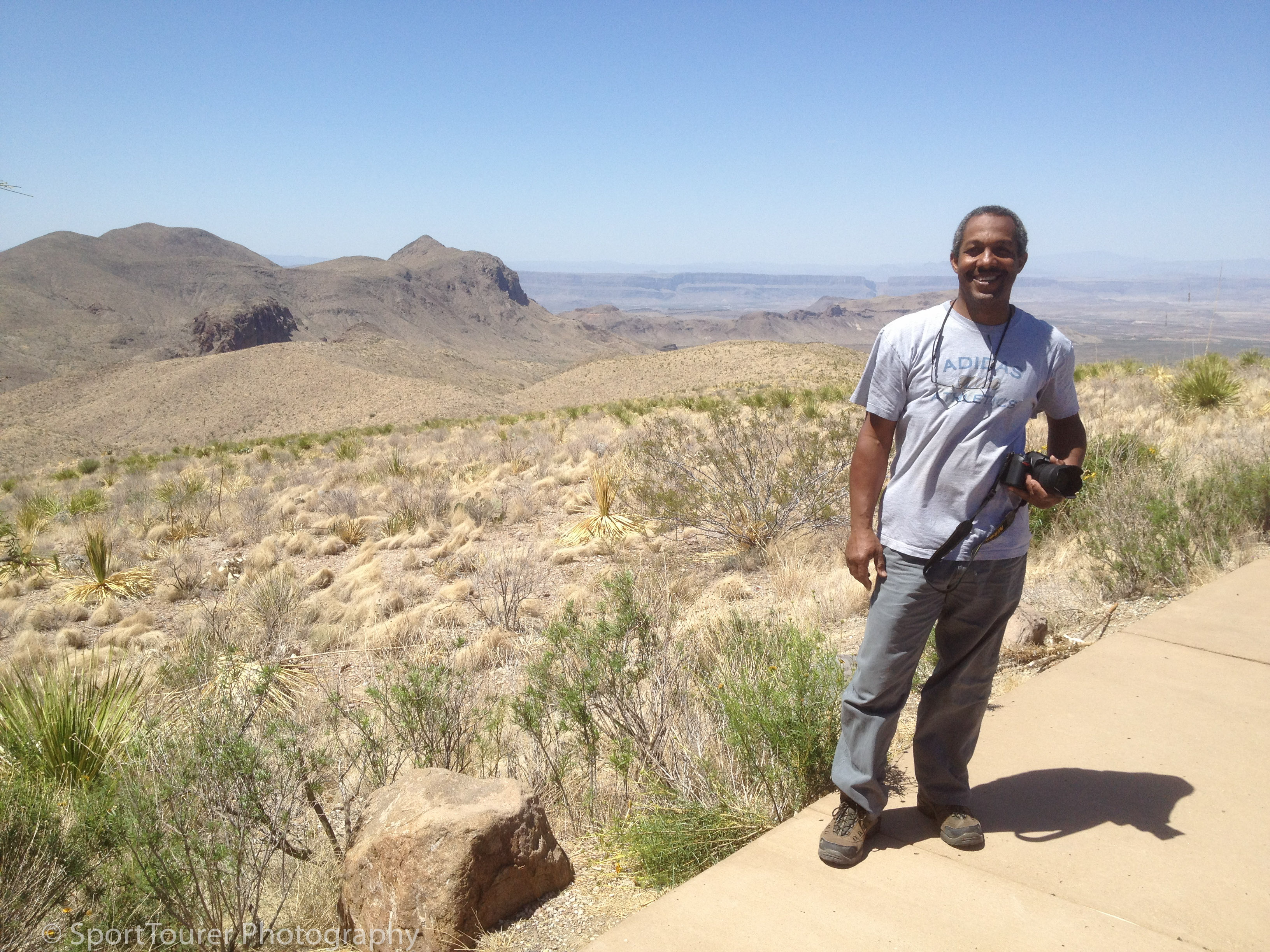  Taking in the sights atop the Topol Vista in the Big Bend National Park. Way off in the distance, just over my right shoulder, the range of mountains - The Chihuahua Mountains, creates a sharp natural demarcation between the United States and Mexico. 