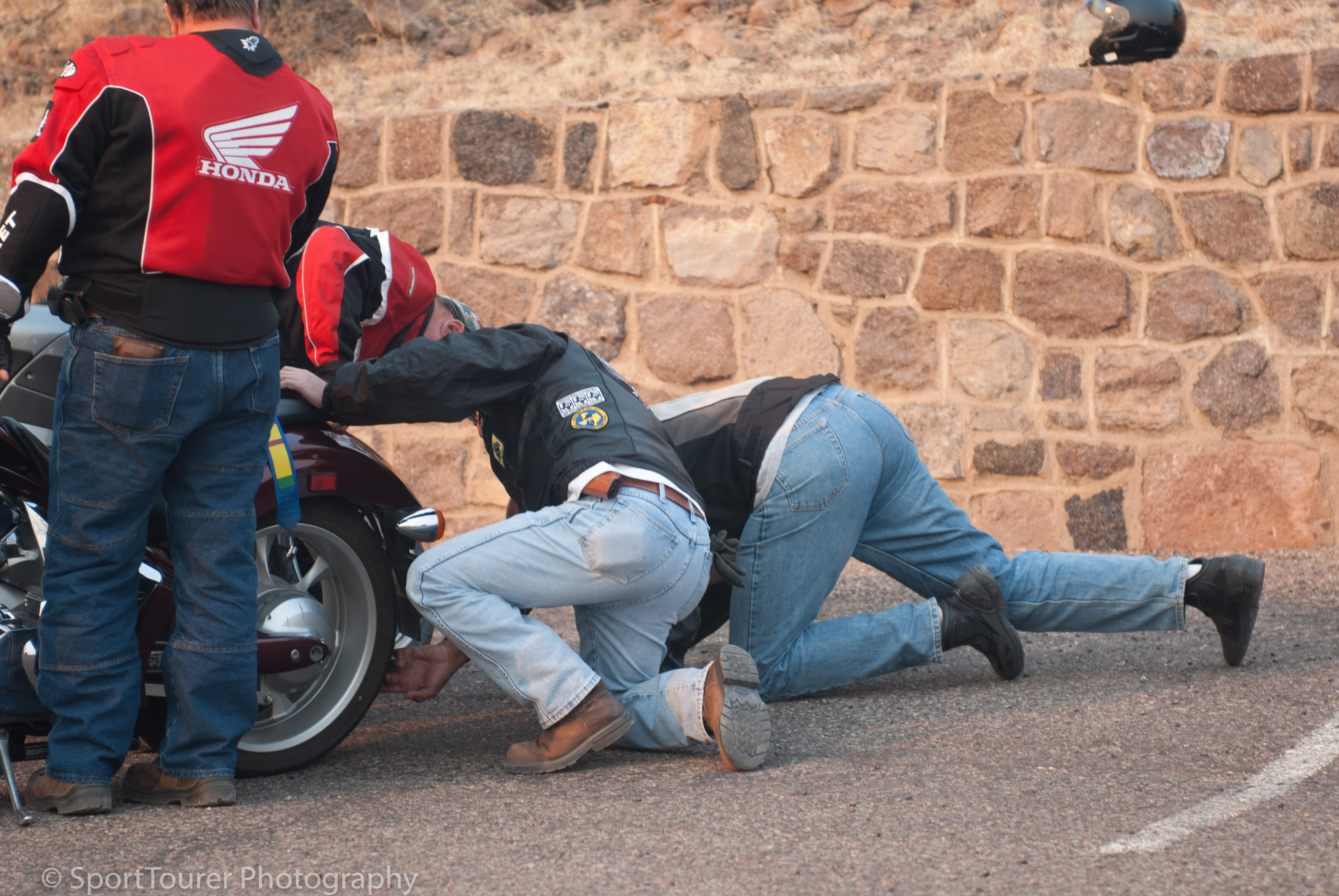  No shortage of help to determine another flat tire atop Mt. Locke, Texas. 