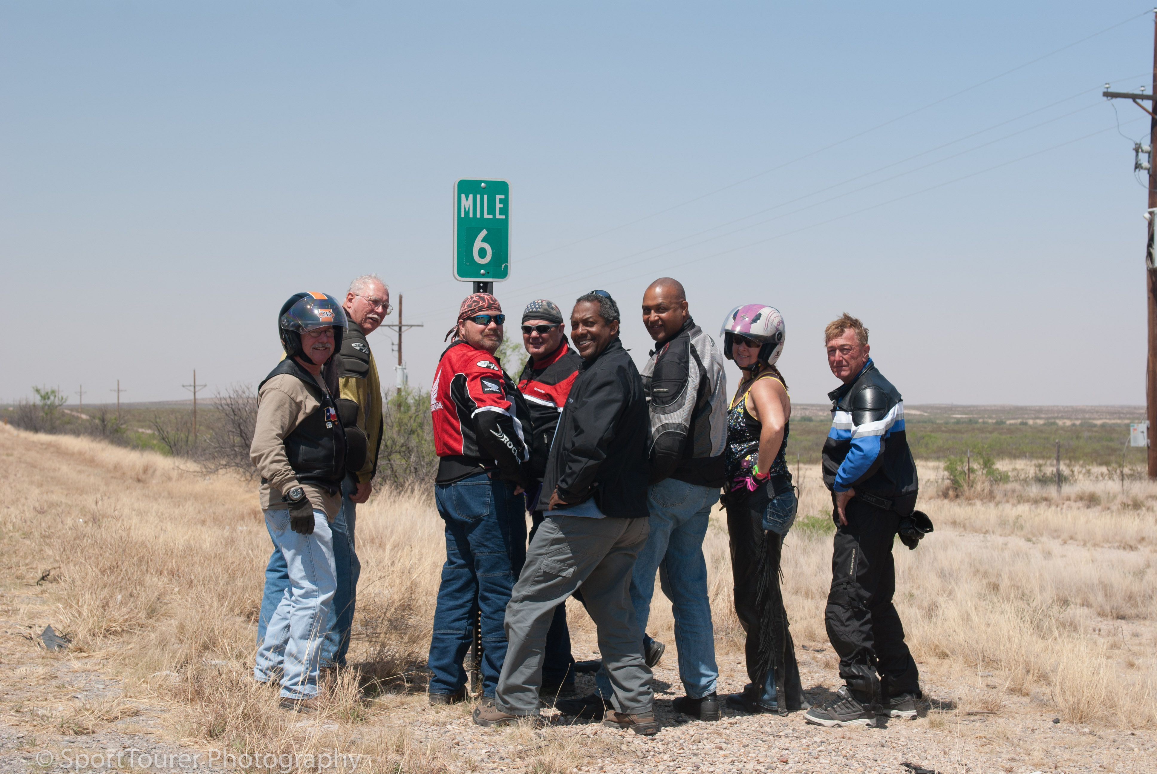  Having already crossed 6 miles into New Mexico, we gathered for this memorable photo - our first stateline crossing photo of our group rides. 