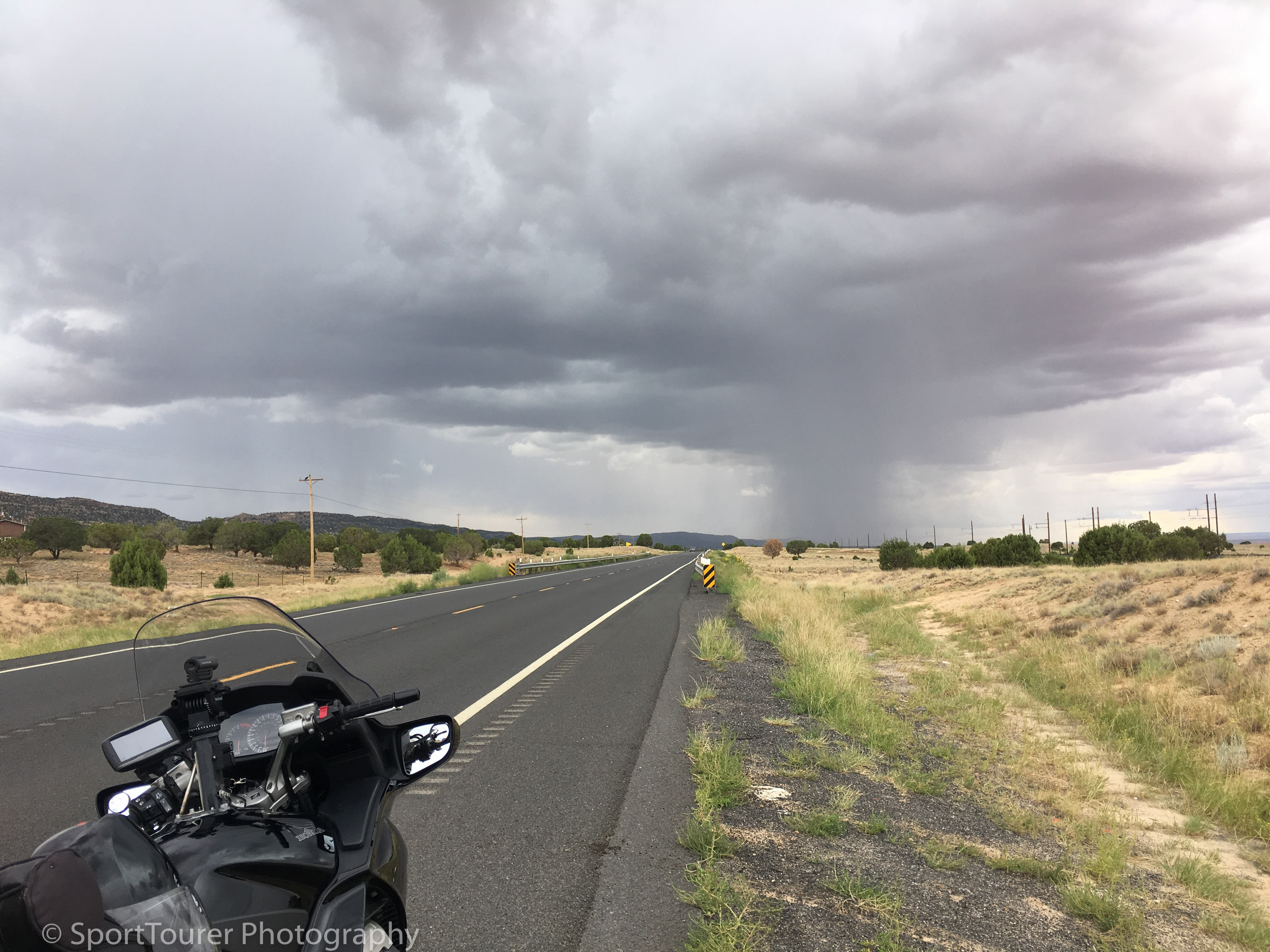  approaching rainstorm along Highway 160 just outside of Winslow, Arizona. It eventually dumped loads and loads of water and moved on as quickly as it apporached - in all of about 35 minutes. 
