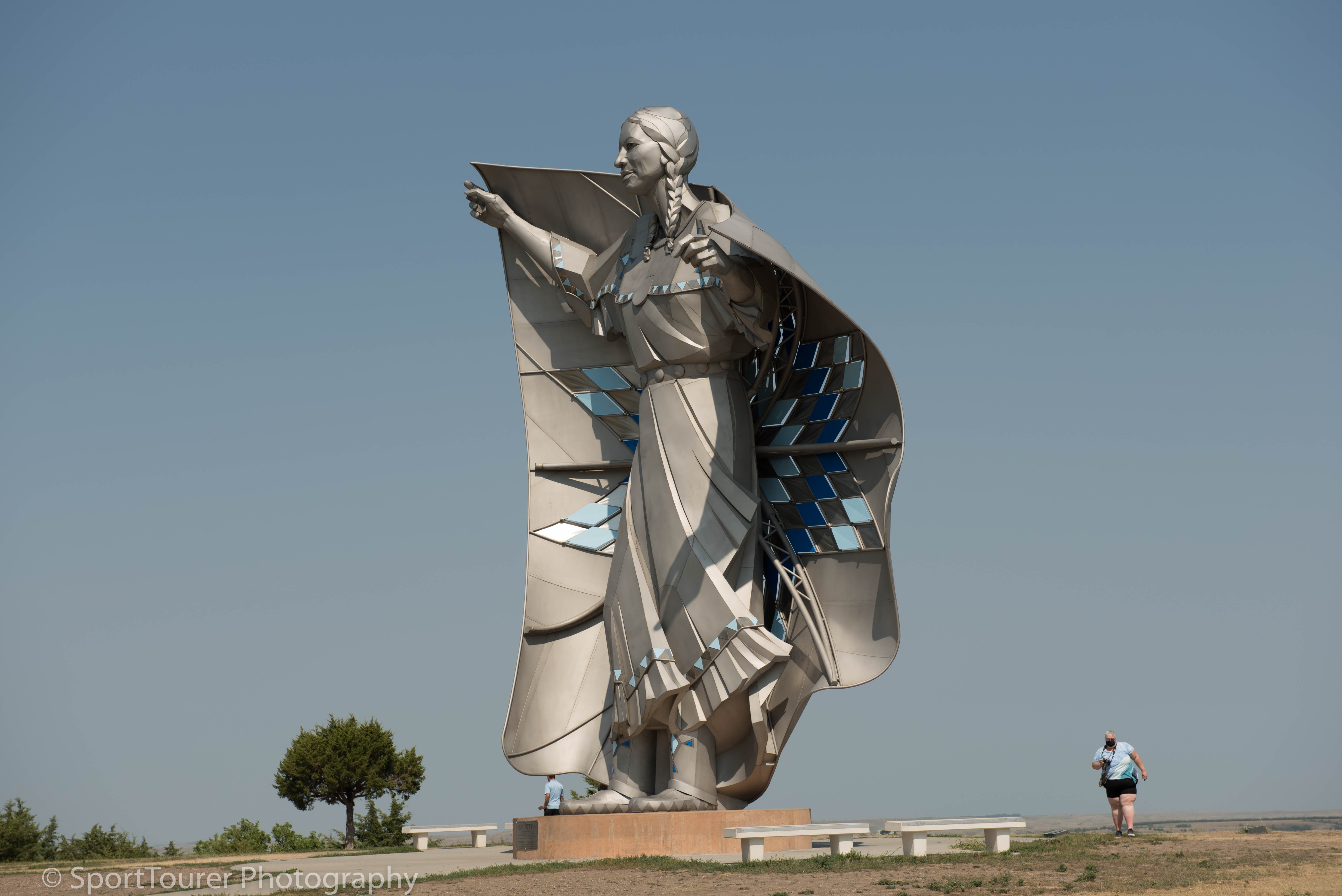  Newly erected statue representing Sacagawea, looming large and overlooking the Missouri River Crossing at the Chamberlain, SD Rest Area Facility 