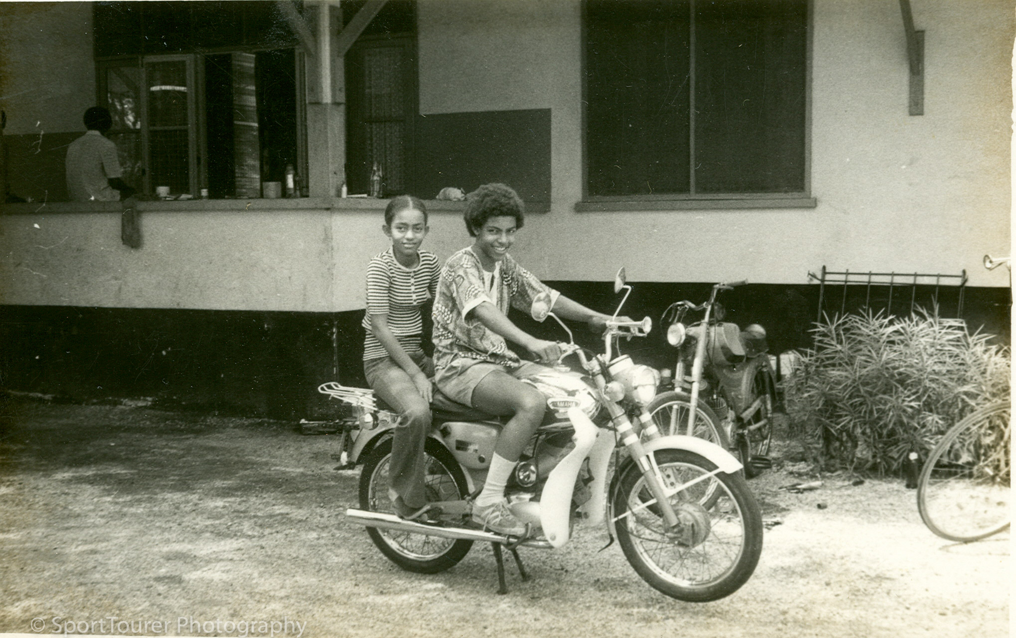  Family friends Lulu and Willi on the newly arrived Yamaha 80cc. Check out the state-of-the-art leg-guards. 