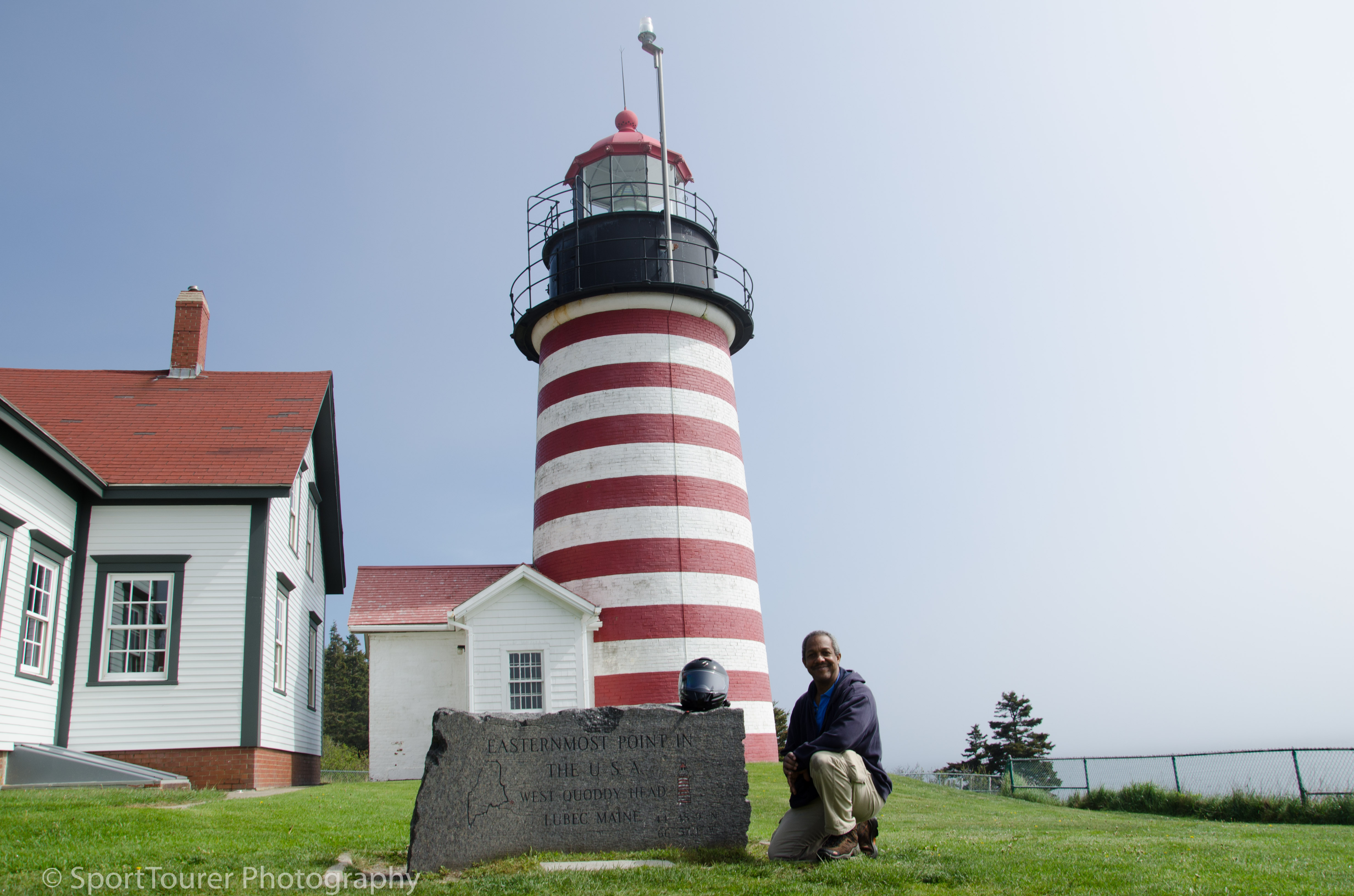  the stone sign of the West Quoddy Lighthouse, indicating the easternmost point in the 