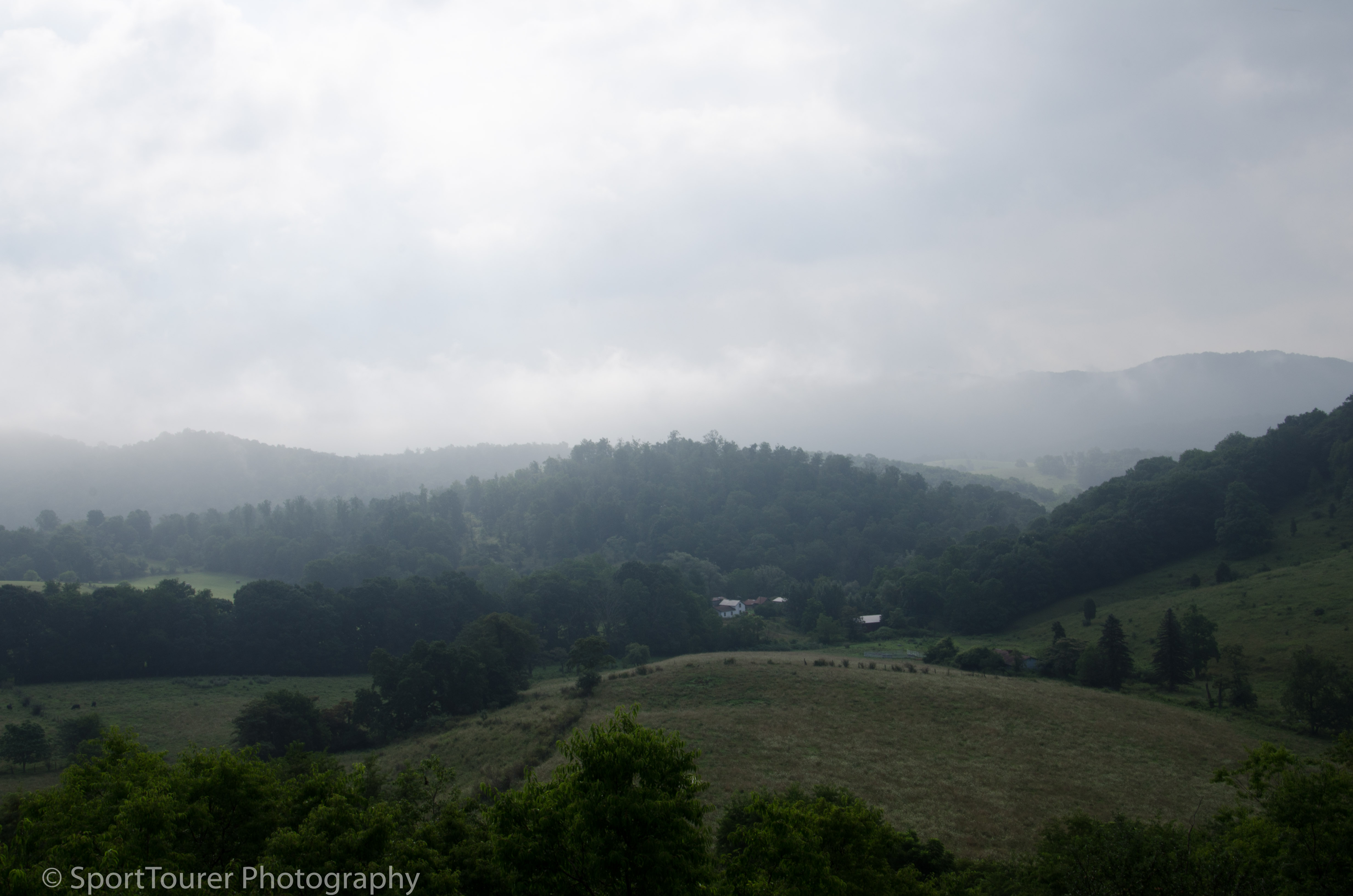  Early morning fog-shrouded mountains along Interstate 77 in Virginia. 
