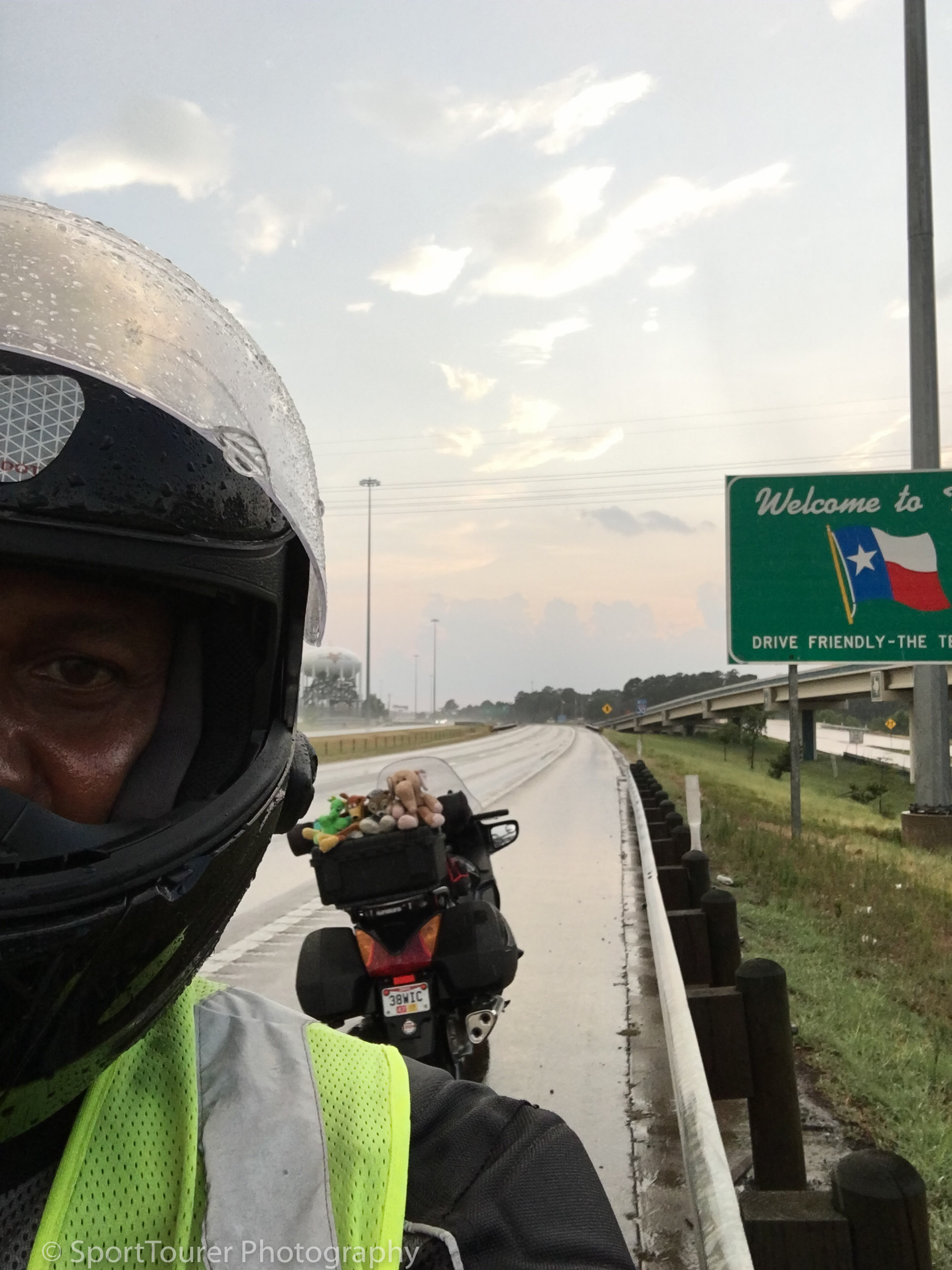  Arriving at the Texas state line and met with a passing shower of rain. 